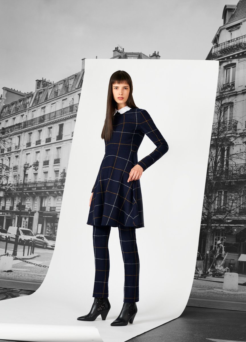 A return to and a revisitation of the basics. The check print is enlarged while the dress becomes a tunic to be worn over trousers. #FW17