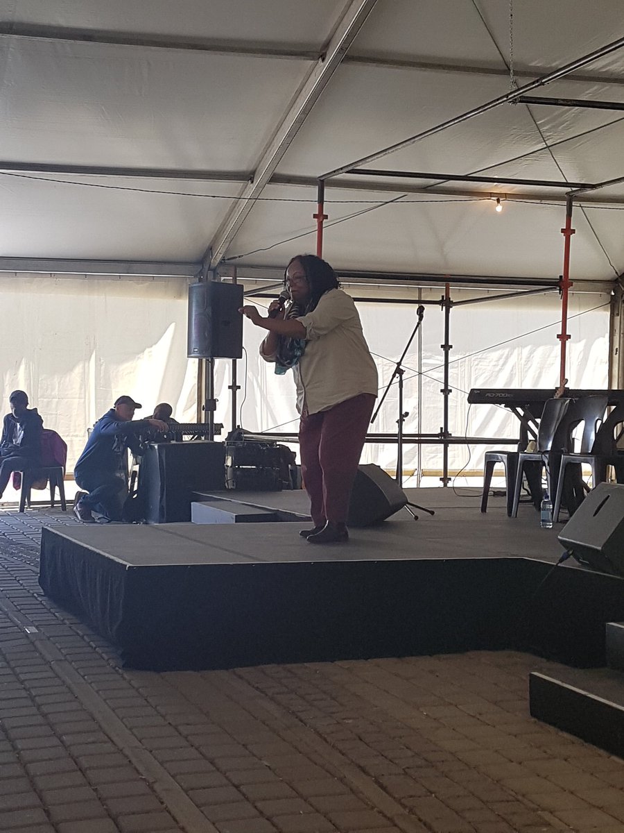 BlckPorcelain's tweet photo. Day 2 of @Jozibookfair. Diana Ferrus performing a poem about her mother voting for the first time. #JBF17 https://t.co/29Puzunhtr