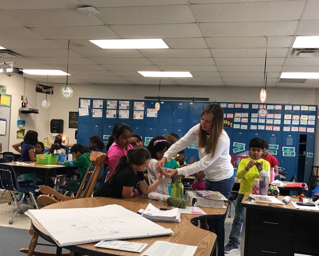 Mrs. Savage teaching finger crocheting during indoor recess. #masonlearns