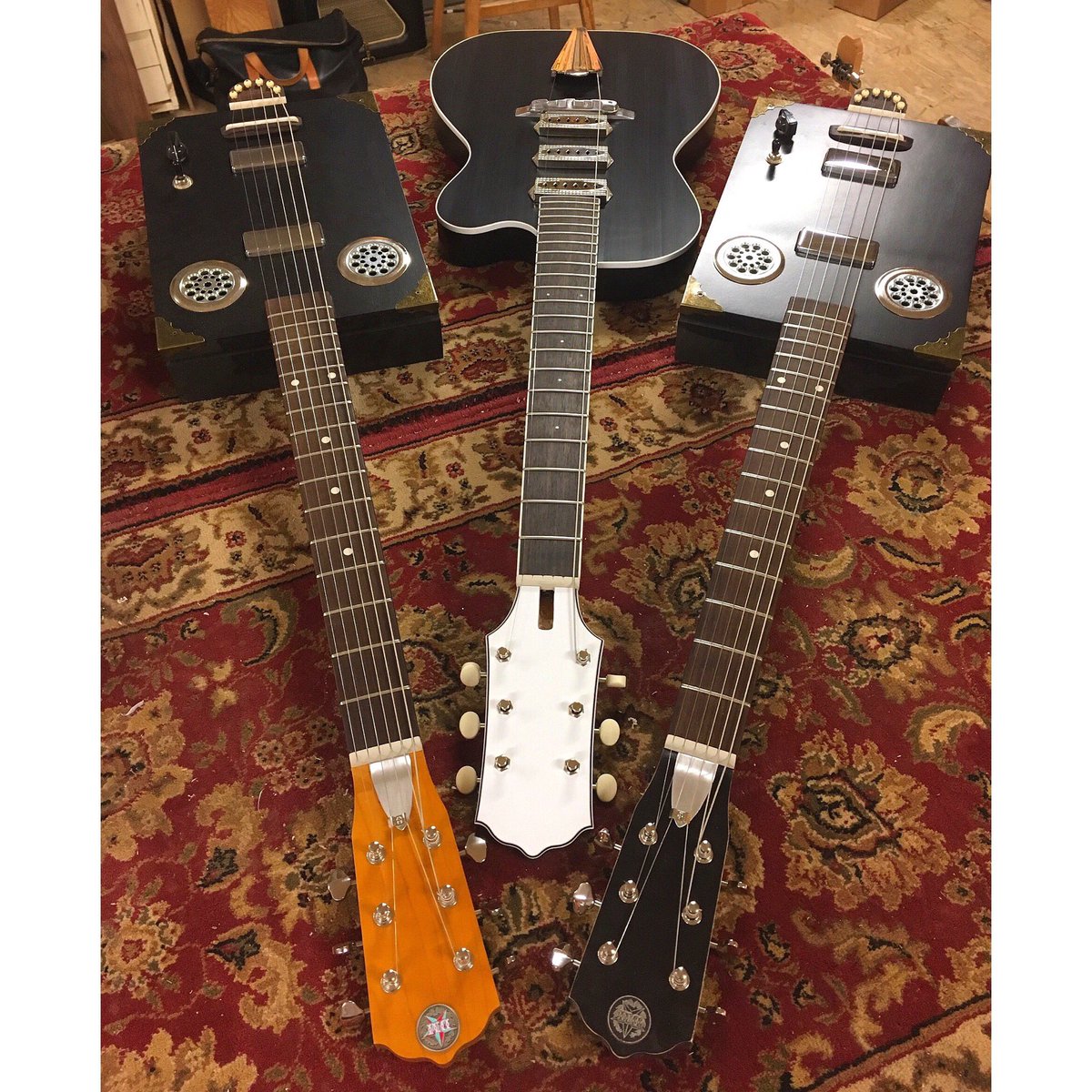 DaddyMojoGuitar's tweet photo. A definite dark brooding vibe going on this week at the shop... #Stovepipe #BeeKay #DaddyMojo #CigarBoxGuitar #CBG #Cigar #Music #Montreal https://t.co/cHrFdK4eiK