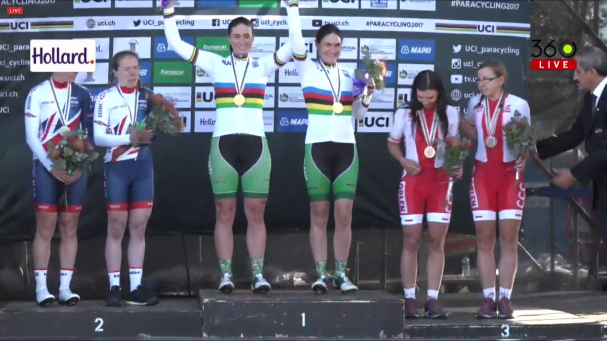 CyclingIreland's tweet photo. It's hard not to get emotional listening to Amhrán na bhFiann belting out for these two superheroes - getting their well earned stripes https://t.co/845aMkv9Jx