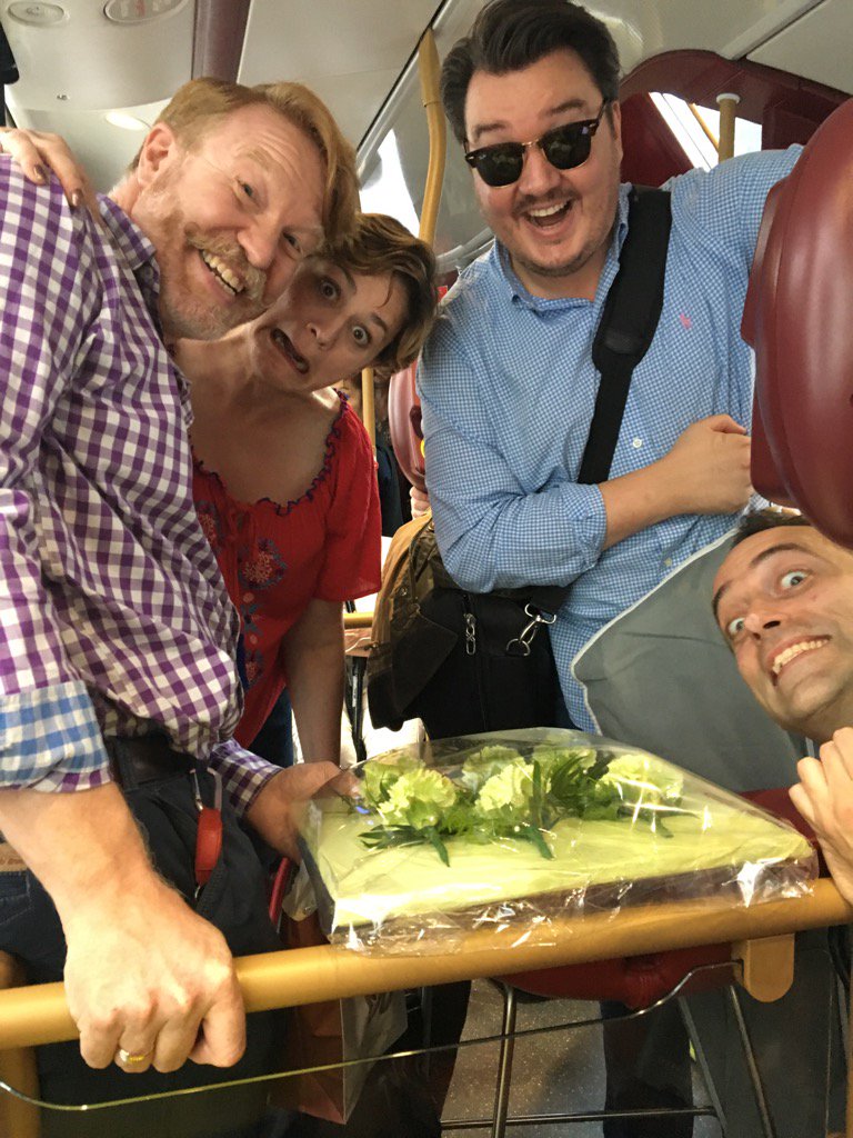 .<a href="/E_N_O/">English National Opera</a> choristers off on a crowded bus complete with stool and carnations to gig <a href="/tatebritain/">tate britain</a>