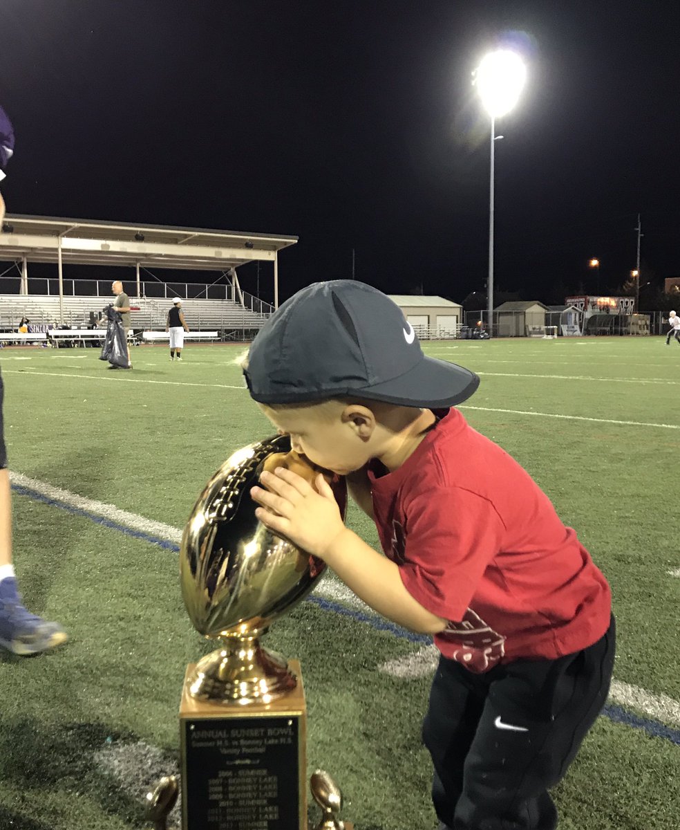 SpencerCrace's tweet photo. 49-13 Victory! Great way to start the season. Bear just kissin trophies! Enjoyed watching our boys fly around tonight. #sunsetbowl https://t.co/ECijLcozTv