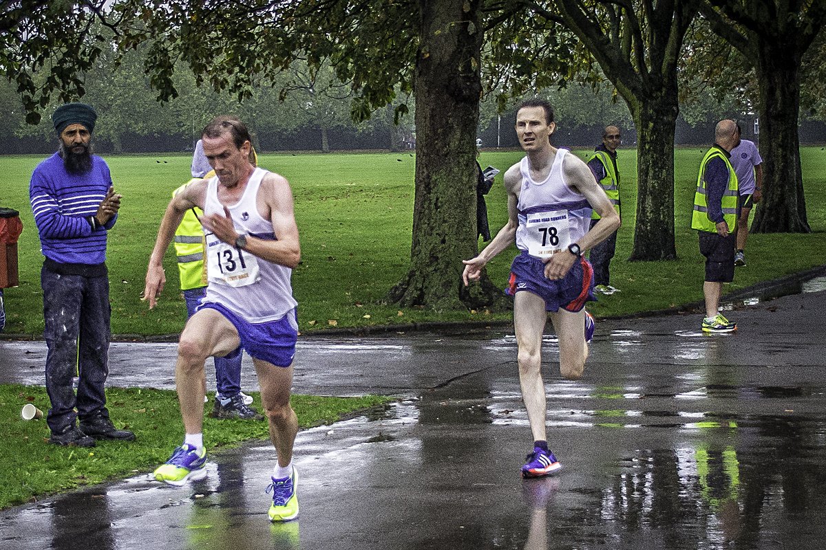 Bank Holiday Monday 5k 2015  <a href="/BarkRoadRun/">Barking Road Runners</a> 
Malcolm Muir, in his own unique style, is not gonna let team mate Steve Philcox catch him