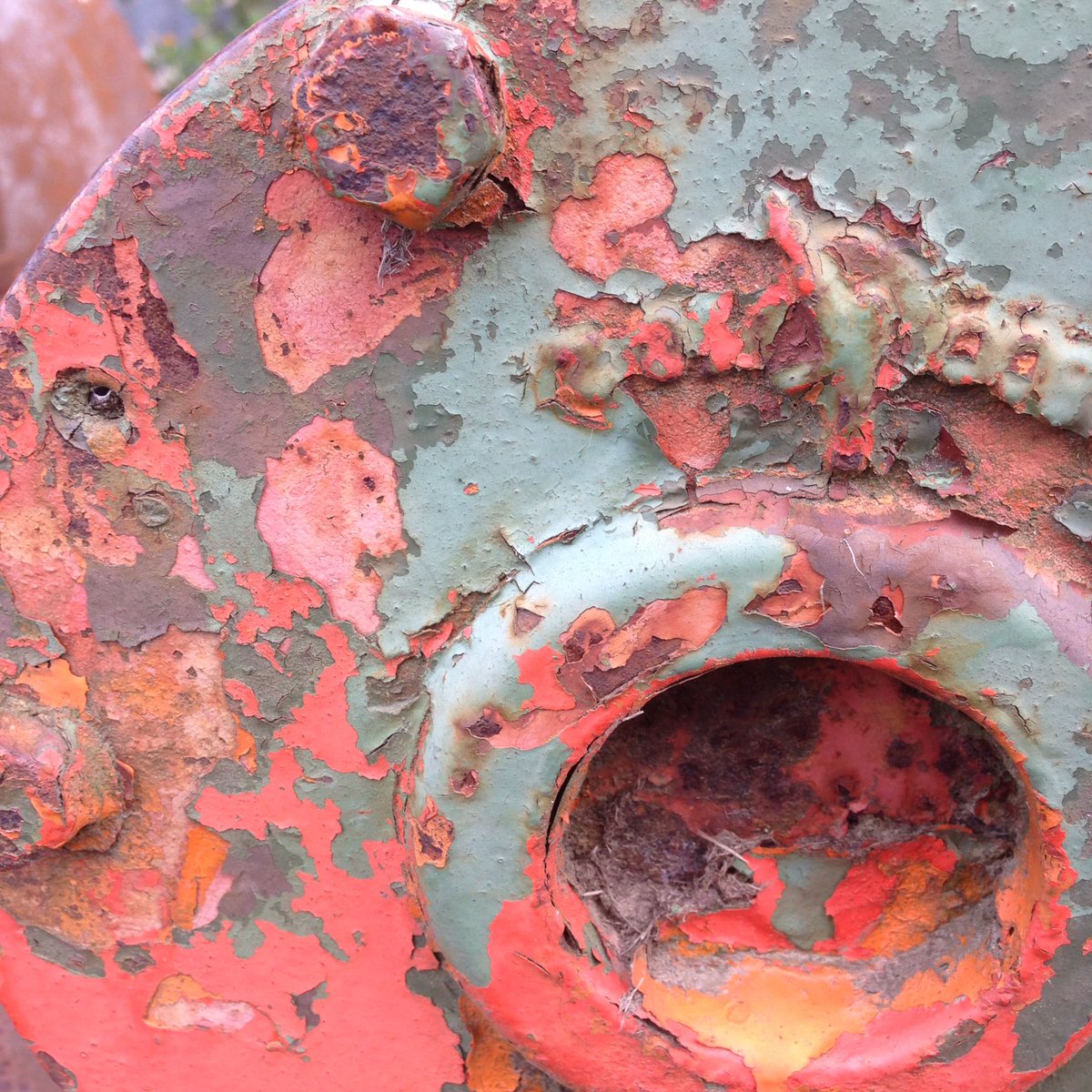 CranbrookIron's tweet photo. Gorgeous colours in layers of #flakingpaint on an old farm mower in for repairs. https://t.co/lmPr0Wh58L