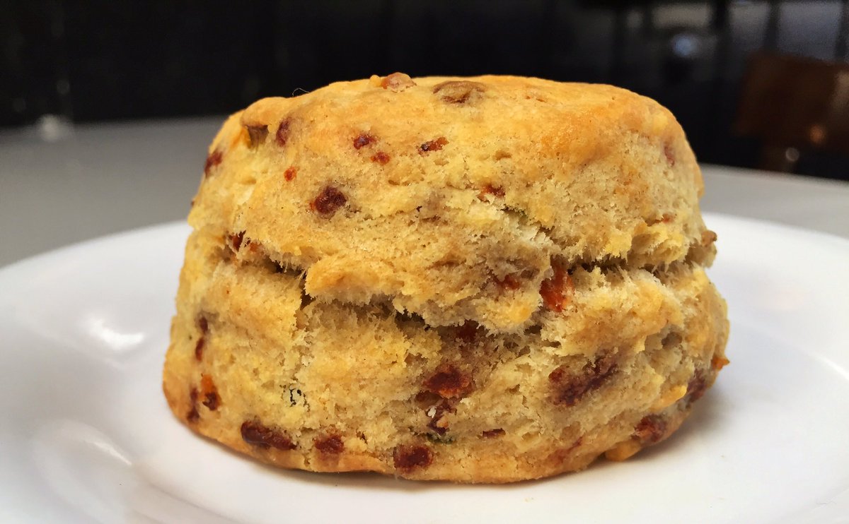 Come Celebrate National Bacon Day with our Cheddar, Bacon and Scallion Biscuit #nationalbaconday #baconday #baconbeatstheheat