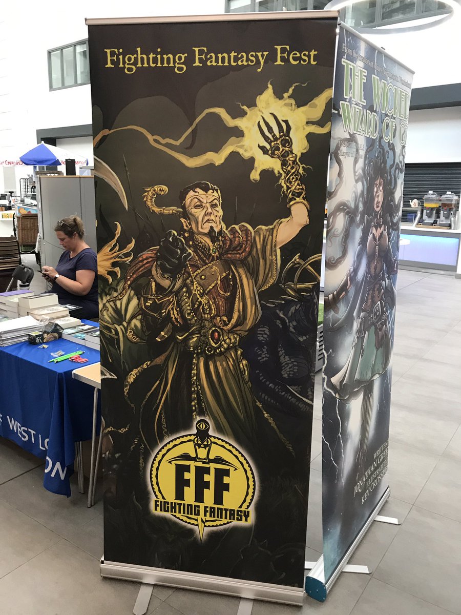 newplanet's tweet photo. Back at Euston after a successful trip to #FFFest2. Met new people, learned lots, spent lots. Brilliant day. @fightingfantasy https://t.co/rR7qWcbyiU