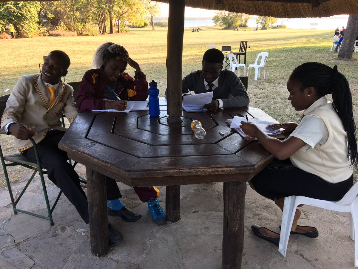 usapglobal's tweet photo. USAPers guided through the college essay process at USAP Bootcamp at Lake Chivero last week. @IntlACAC @HigherLifeFDN @IIEglobal @NAFSA https://t.co/PKWtHUGm9y