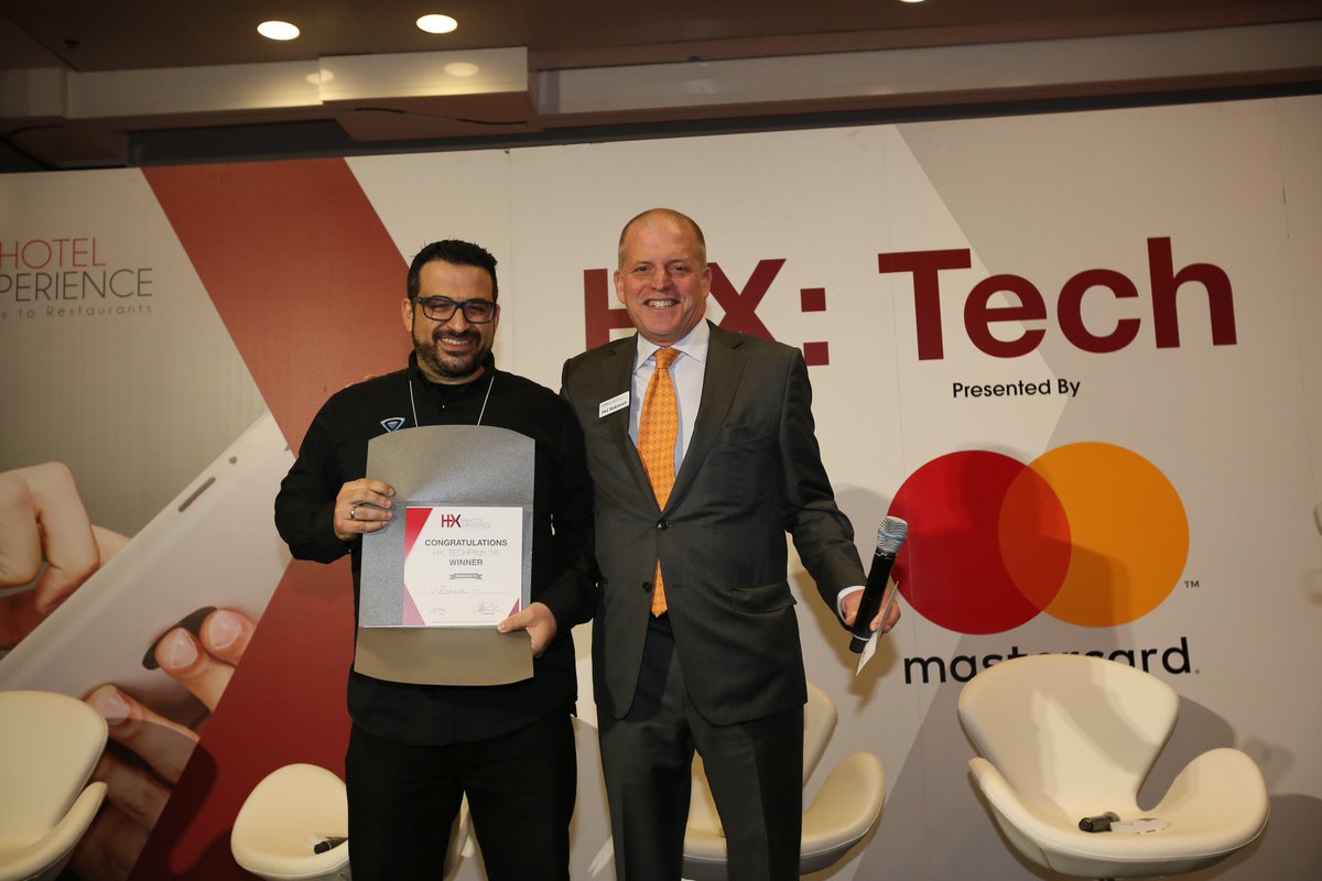 HXHotel's tweet photo. @Zoottle accepting their TechPitch award at last years show. Interested in joining in on the fun register here: https://t.co/pAdxDJqRv7 https://t.co/yOQCzleLkV