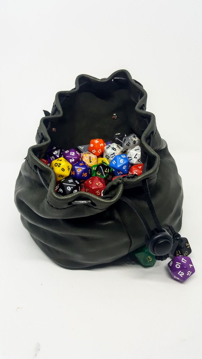 EmBraceDragons's tweet photo. A Leather Dice Bag for 150 Dice with a hand painted Glass Dragons Eye.
#dicebag #dungeonsanddragons #dice #dragons #leather #dandd #rpg https://t.co/7FWzyy1VqM
