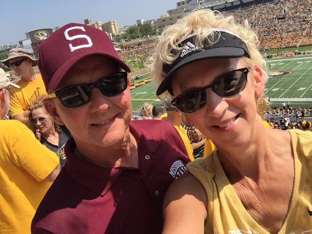 REMaggard's tweet photo. @KimChismJasper and I in CoMo at a football game between our alma maters. Hers won, but mine showed up. #BearUp https://t.co/pDxzUZQiax