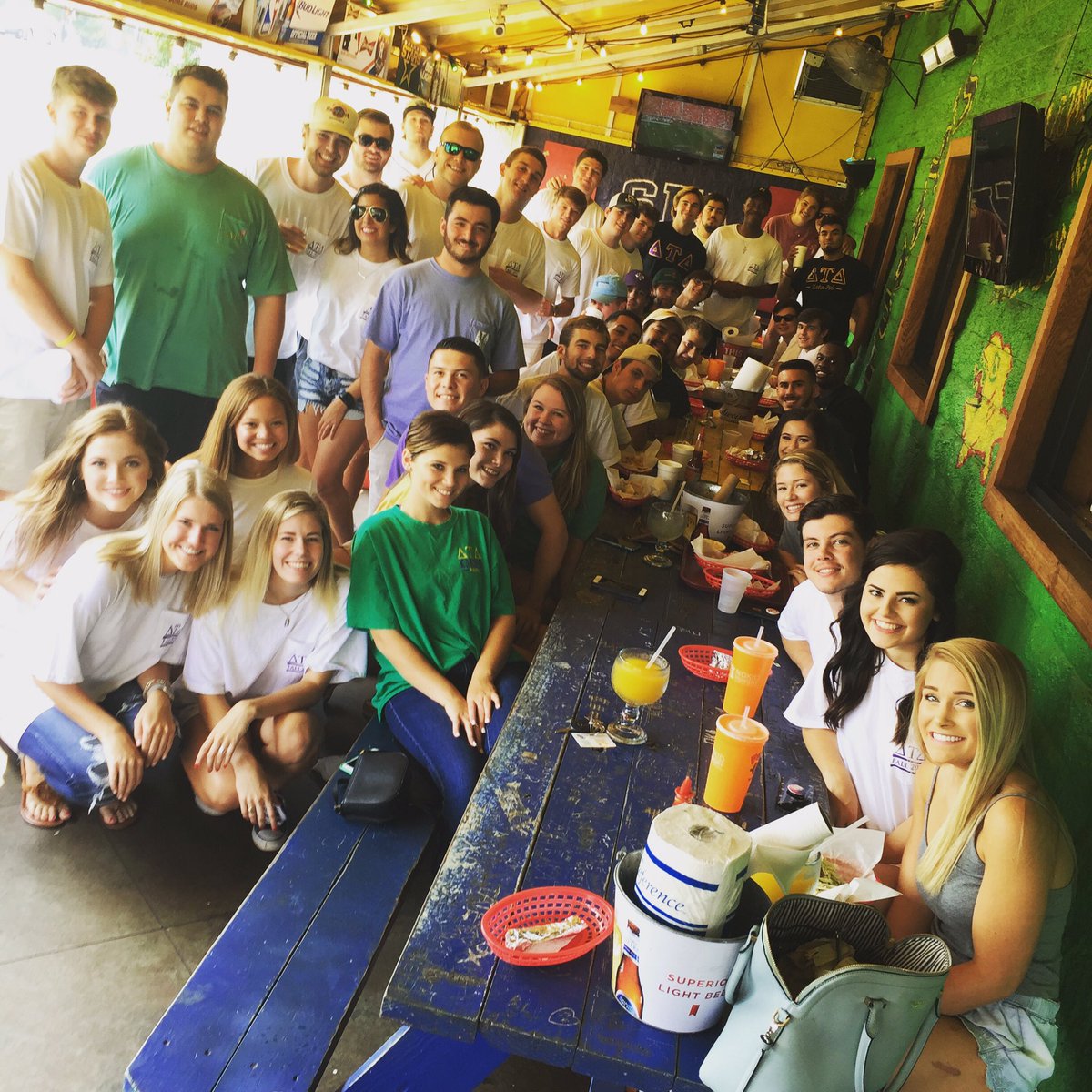 FuzzysNac's tweet photo. Fuzzys had the pleasure of hosting ΔΤΔ on our patio this lovely afternoon! #patiotime #washersandbooze #lovelyweather https://t.co/OCxXjYPYIJ