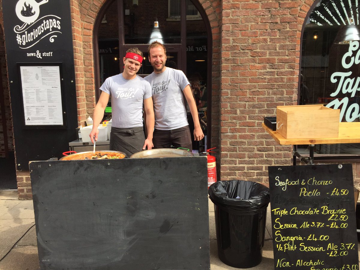 fossgatefest's tweet photo. @ambientetapas boys are back again with their cheeky grins, #paella, #sangria & #beers! #visityork #york #fossfest https://t.co/xBlGge4BdG
