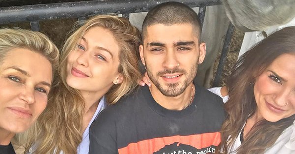 enews's tweet photo. Gigi Hadid and Zayn Malik (and their moms!) came together to celebrate Eid al-Adha: https://t.co/X5928c9Fb3 https://t.co/KCEq5nJ5ow
