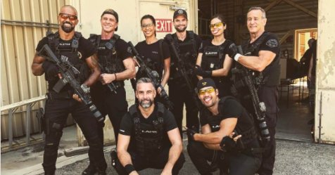 How well does the SWAT cast know the iconic theme song? | TV Guide