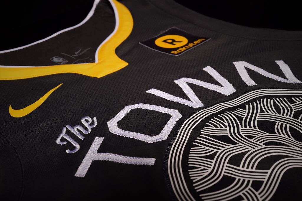 warriors's tweet image. After a 2+ year process, we’re excited to unveil The Town jersey - part of our ongoing commitment to Oakland &amp;amp; East Bay fans. #DubNation