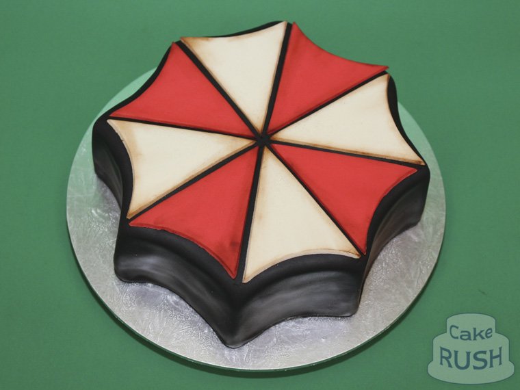 CakeRush on X: "Here is our #cake of the logo of the evil #Umbrella Corporation from #ResidentEvil, made of vanilla sponge and red velvet to echo the logo! https://t.co/GZzeR7gGy8" / X