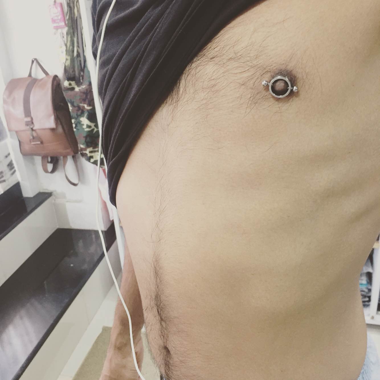 Man navel piercing deals