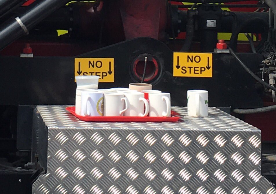 EmmaSamms1's tweet photo. A tray of tea mugs: a wonderfully British addition to a fancy fire truck at @Glos_Police #GPOpenDay17 https://t.co/4OgEDmje24