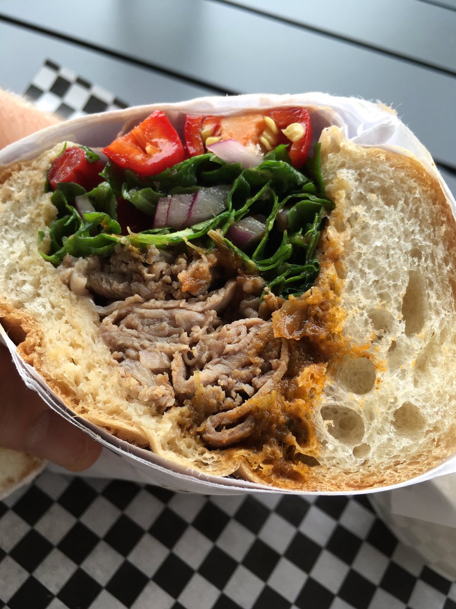 heavytable's tweet photo. Loving the lamb sandwich (w/harissa, peppery greens, Fresno peppers) @theoriginal42nd ^JP https://t.co/IwMMQN3HWx