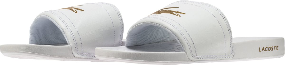 white and gold lacoste slides