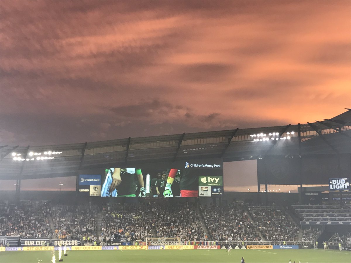 SandyChapman7's tweet photo. It's nothing but revelry, red cards and really questionable reffing under the red sky...#SKCvNE #ibelieve https://t.co/AwugCb4yMb