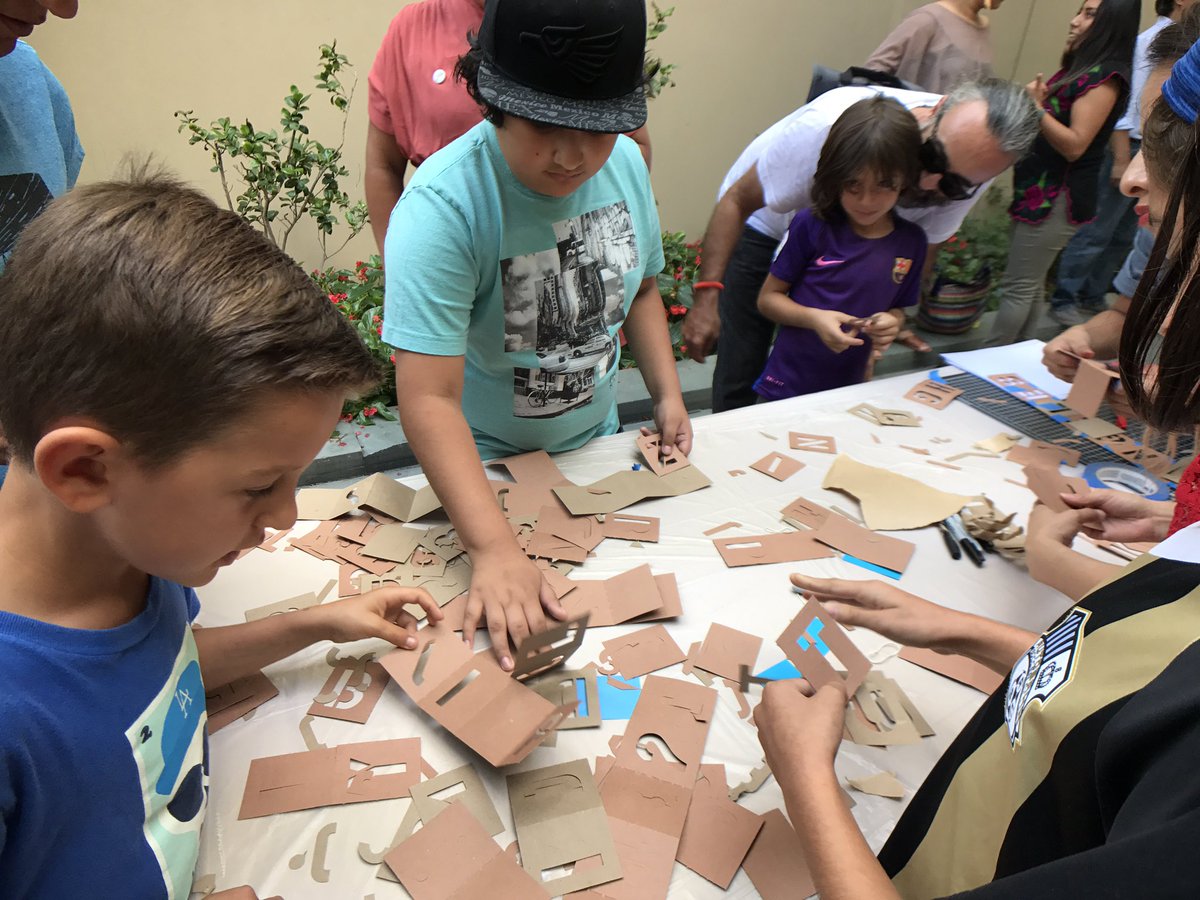 Children making stencils