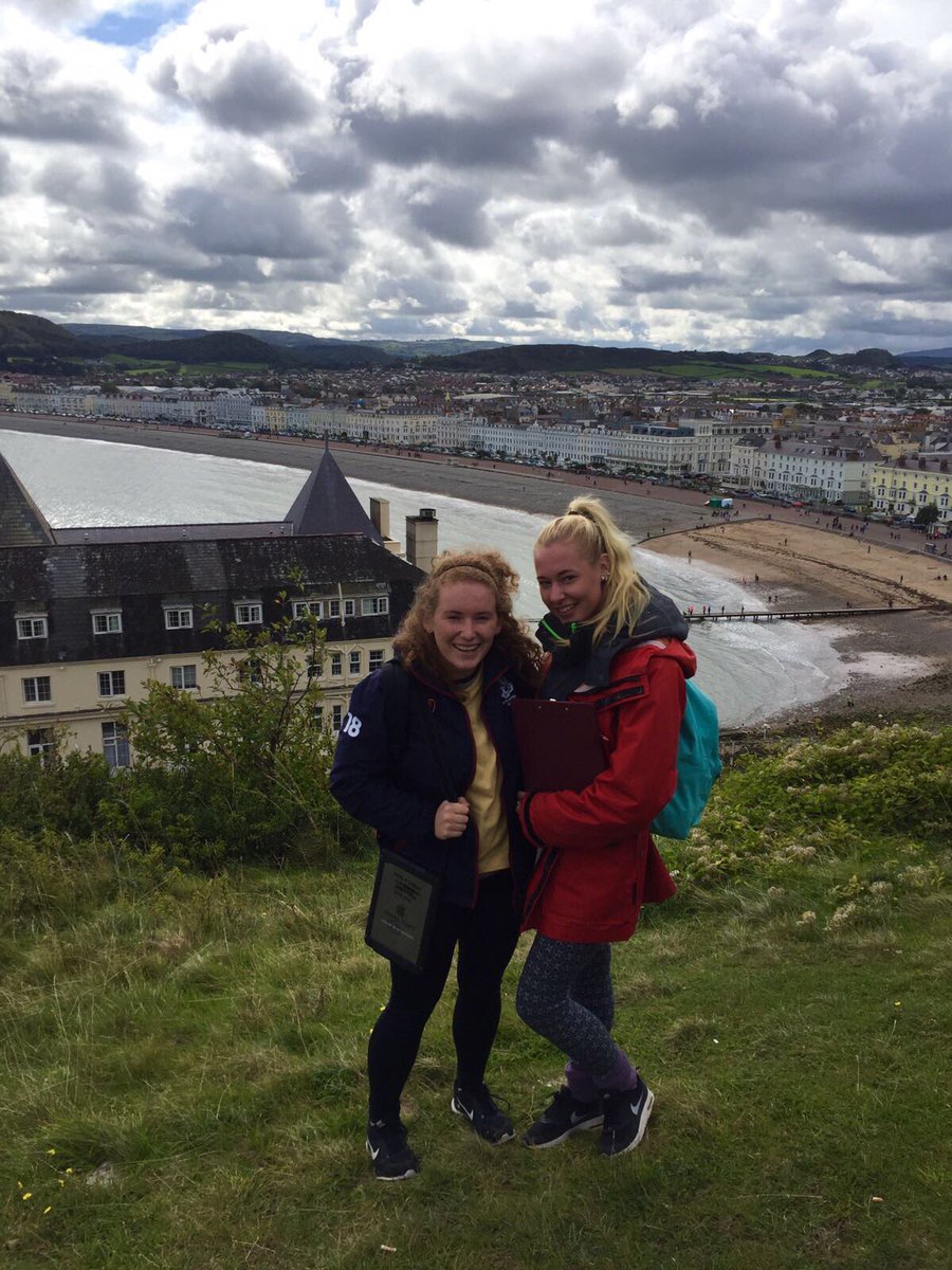 Head of Hath Lizzie and Hath Head of School Izzy are loving living the outdoor life in sunny Wales #geographyfieldwork #rockingtheiranoraks