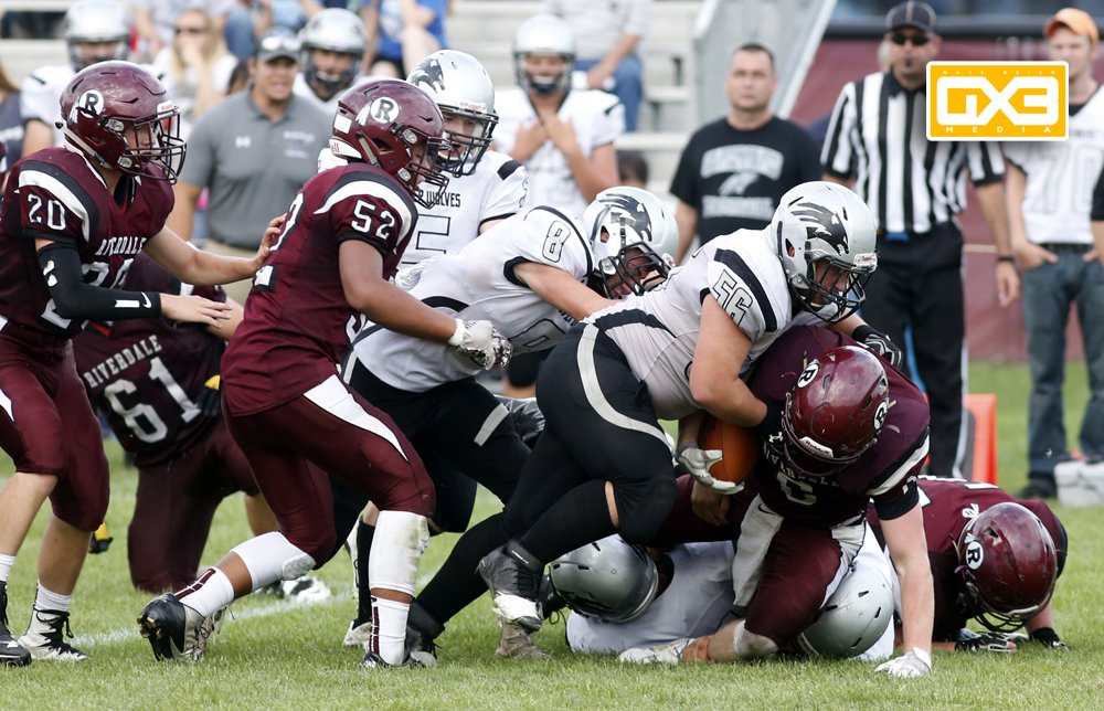 NBGX3Media's tweet photo. NO FORWARD MOTION #wcwsilverwolves' Jed Fanta, Monty Jennings drive #riverdalechieftains' Caleb Johnson back #westonsilvereagles #wcwolves https://t.co/JTEeUxoquq