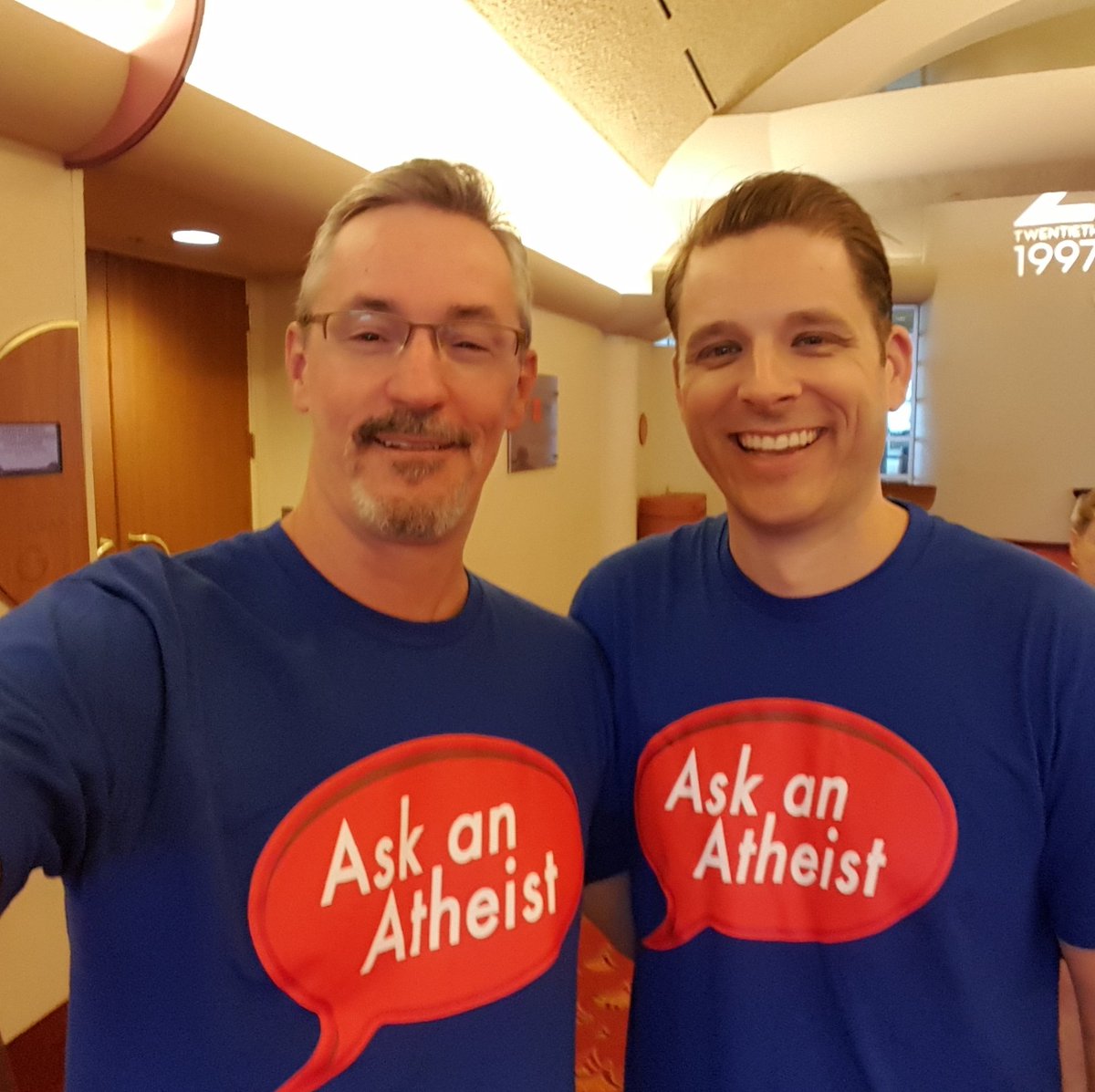Freethoughtful's tweet photo. Sporting my traveling shirt with @AndrewLSeidel today as I return from #FFRFCon2017. Another fabulous @FFRF Convention. https://t.co/dXiYTVLxaY