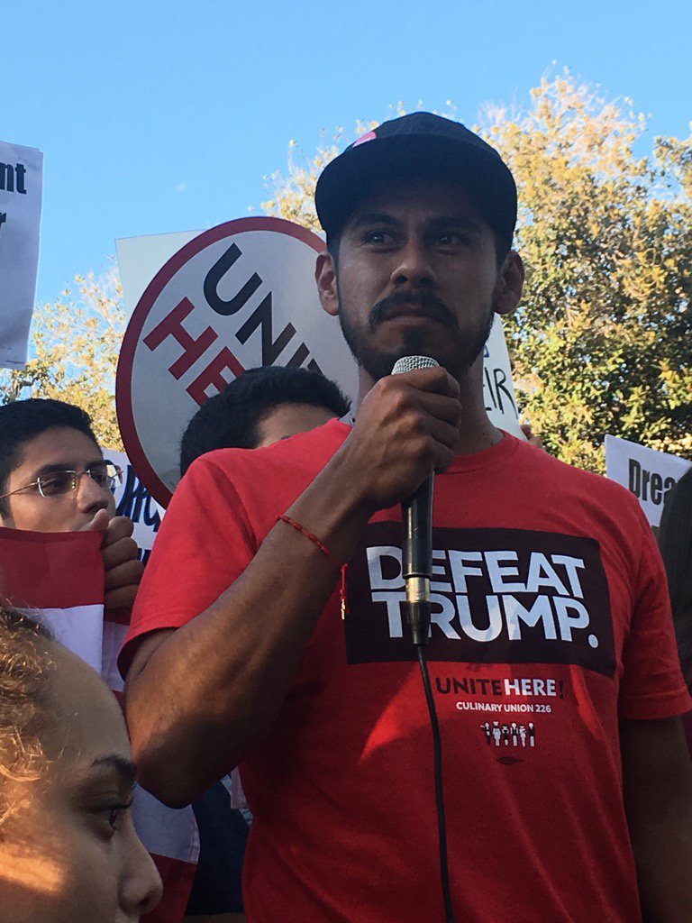 HugoForCD13's tweet photo. Christian Torres from @UNITEHERE11 telling Trump "I am not giving up my DACA to build your wall" #DACA @unitehere https://t.co/wrftJsoCmq