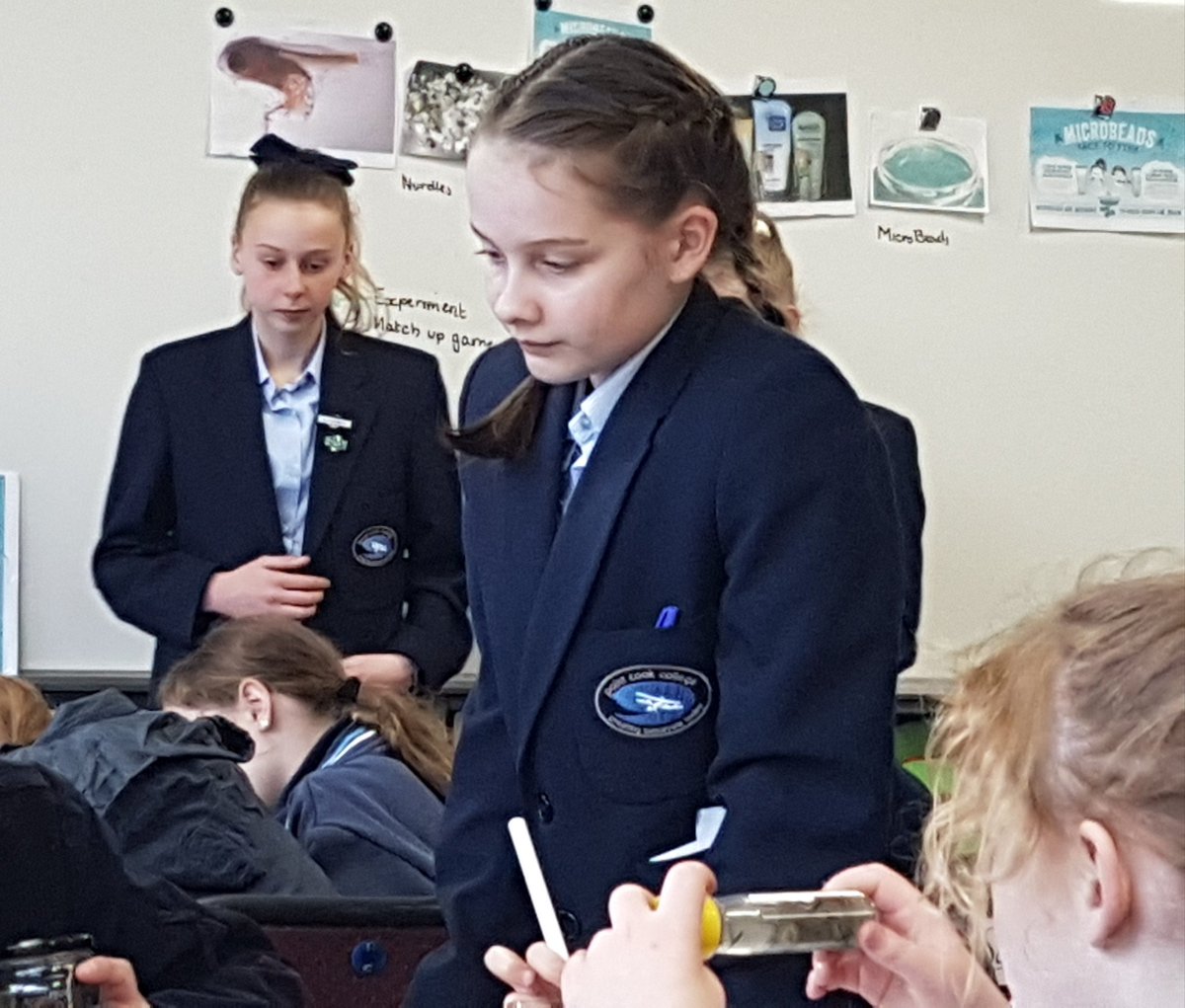 PCCP9's tweet image. Georgia engaging with students in PCC's workshop on microbeads and nurdles. #KTKweek2017