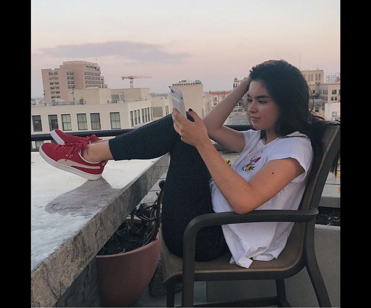 Sitting on the rooftop staring at my phone