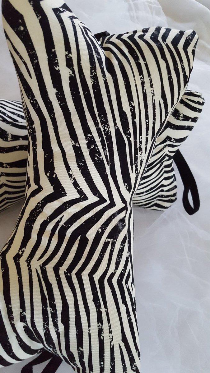 Zebra stripe neck pillows
SCfashioncreations.etsy
