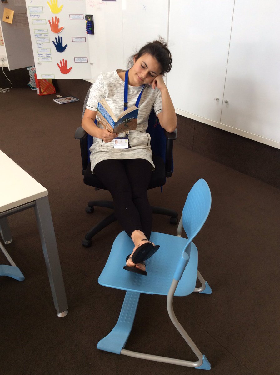 Y6Jesmond's tweet photo. After being back for a couple of days, Miss Perry is finding some time to relax and read Holes. #JGReading https://t.co/Y3Nl6LaOxE