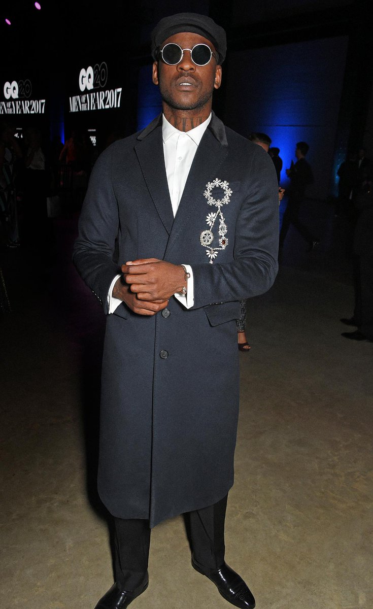 on Twitter: ".@Skepta attends the @BritishGQ #GQAwards in London wearing a navy @Burberry top coat and brooch https://t.co/LU7JynpsVl" / Twitter