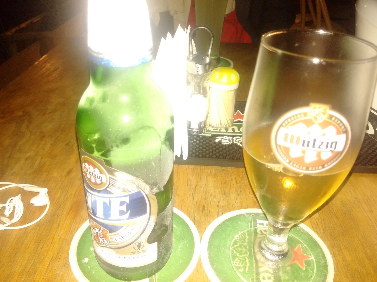 TherealKwizera's tweet photo. Long day, cold evening and this guy #MutzigLite @CHOMADrw https://t.co/4D2Z0cc9W1