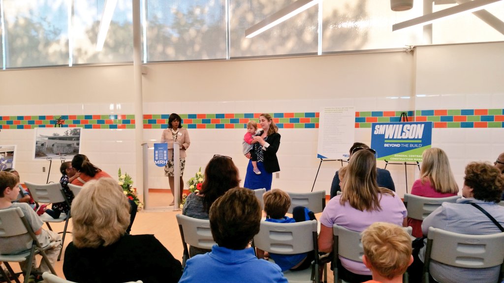 N_Day22's tweet photo. What a small world! @UnitedWaySTL's Katie Kauffmann, board president of @mrh_ecc, speaking at ribbon cutting for @bondarchitects bldg! https://t.co/5O7sFBQvP3