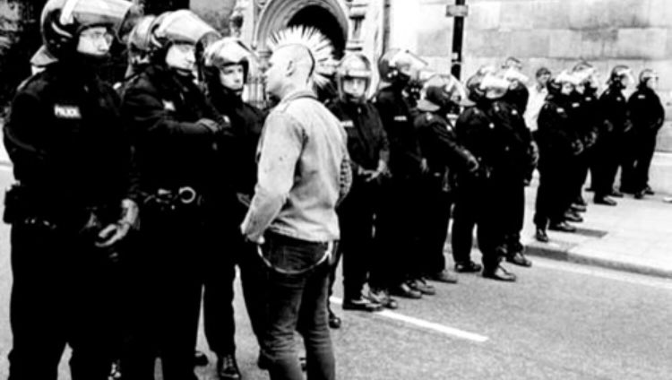 ashomam's tweet image. Punks vs. cops (the last one is my fav lolol)