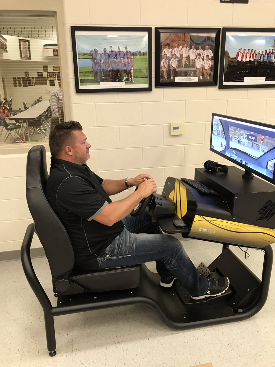 GrittonRob's tweet photo. Tim Weis from Weis Insurance Agency demonstrates the distracted driving simulator for St. Anthony Students in Effingham, IL. #stateauto https://t.co/erVciDUTYK