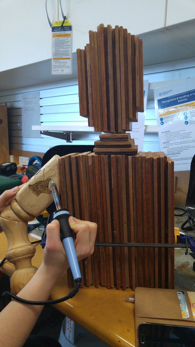 AmandaASMS's tweet photo. Salvage, sculpt, sustain bringing the goods - tattoo sleeve on a wooden sculpture made from table legs and floorboards #asmsISF https://t.co/MD953tm0ng