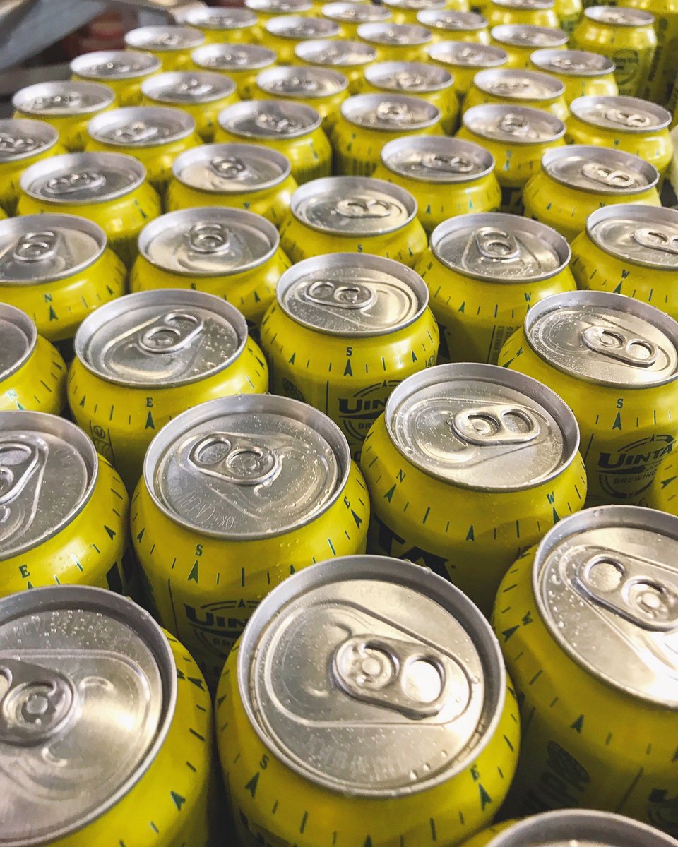 UintaBrewing's tweet photo. This scene never gets old. A stream of cans loaded with fresh Hop Nosh IPA heading down the packaging line. #hopoutforanosh #insideuinta https://t.co/dY8DNMfDKK