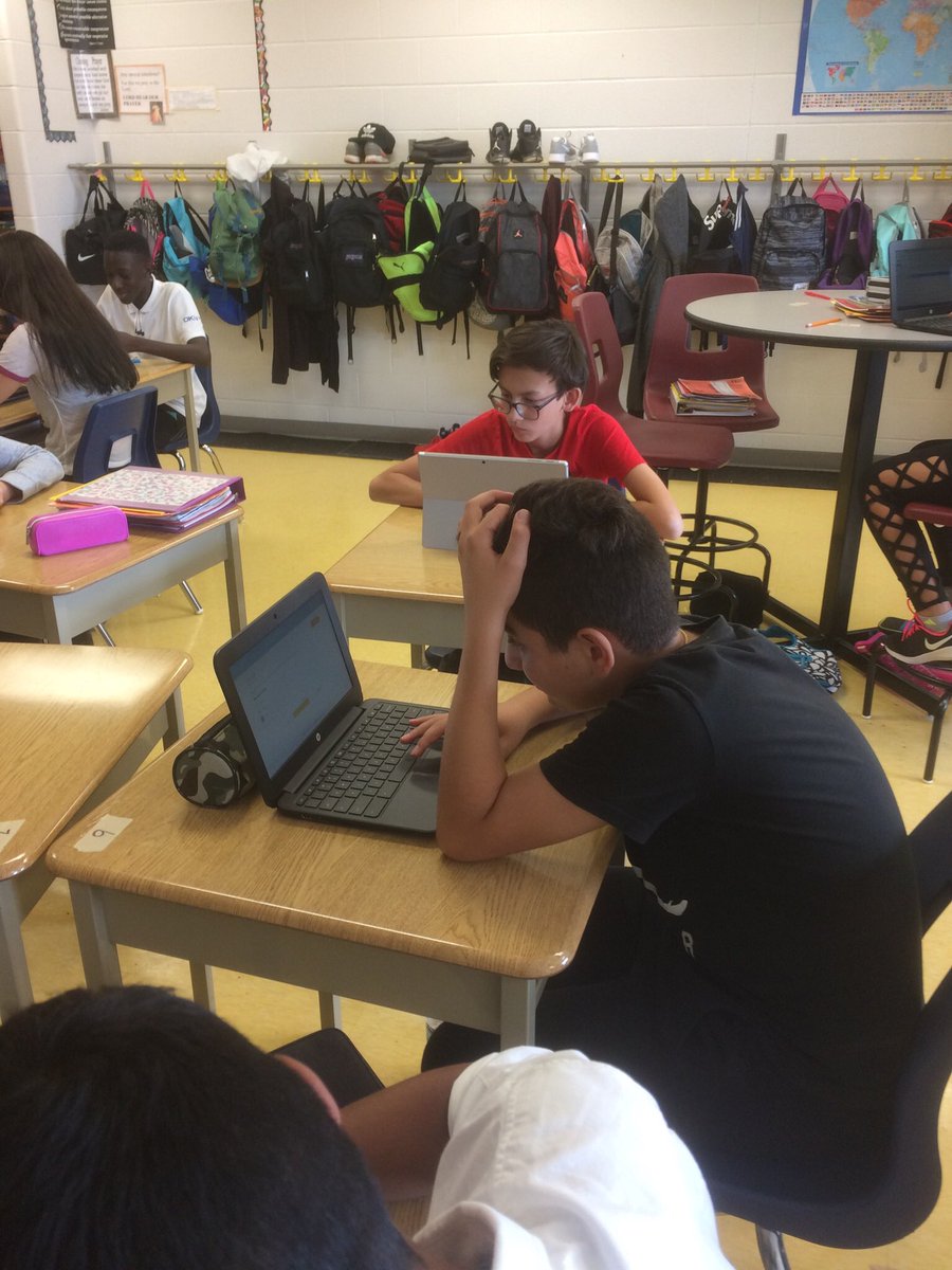 Grade 8s working on a Reading Diagnostic on Socrative.
