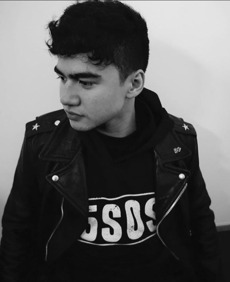 wearing his own band's merch