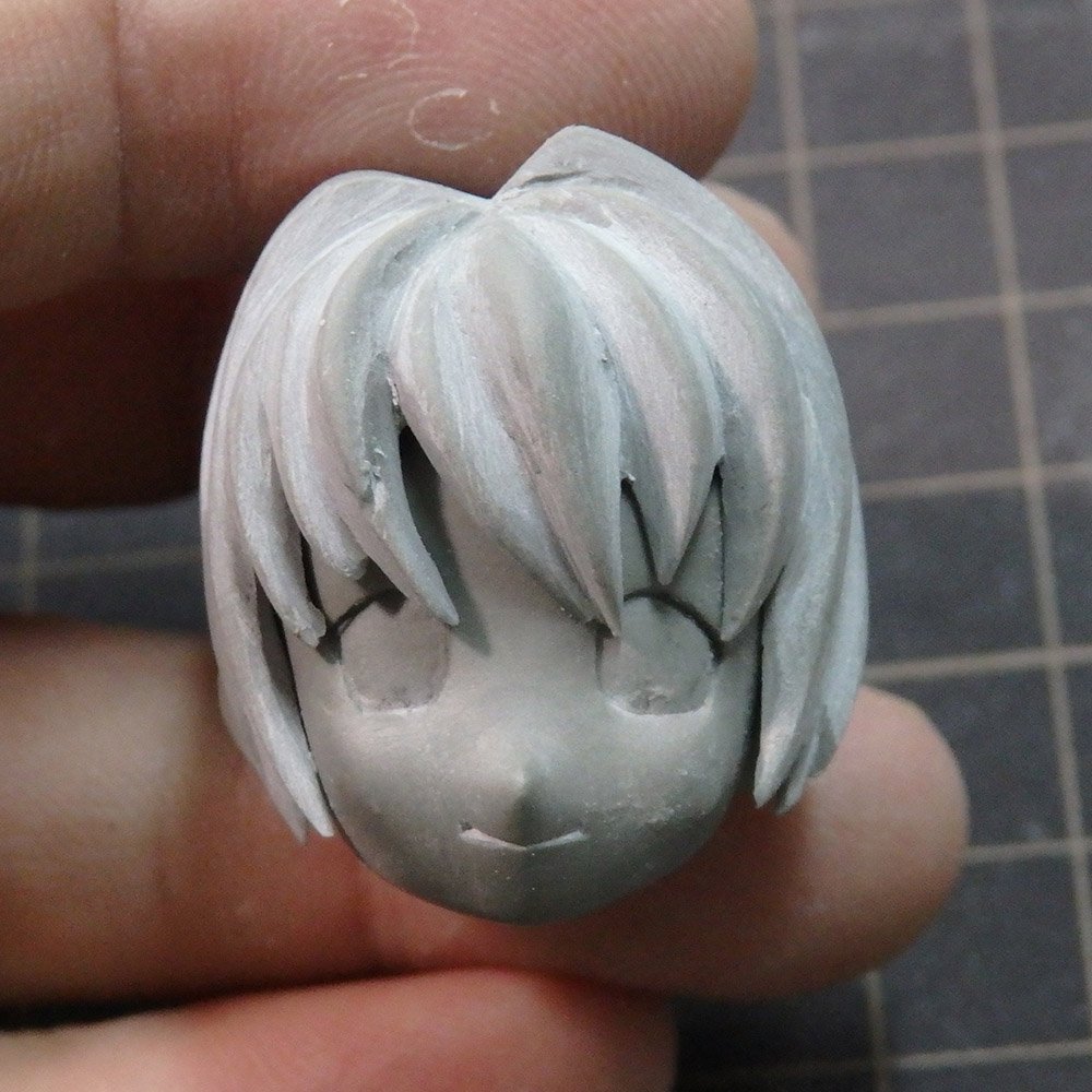 代々木アニメーション学院大阪校 新校舎 なんば校 さて続き ぼちぼち胸像制作も追い込みですー 前髪を作りますよー 特にデザインなくぶわーって作り出したのでざっくり盛りつけて削って 最初と髪型違いますね 笑 立体感が出るように作りこむので