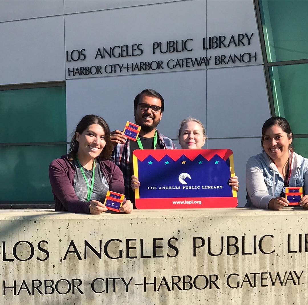 Library staff with library card