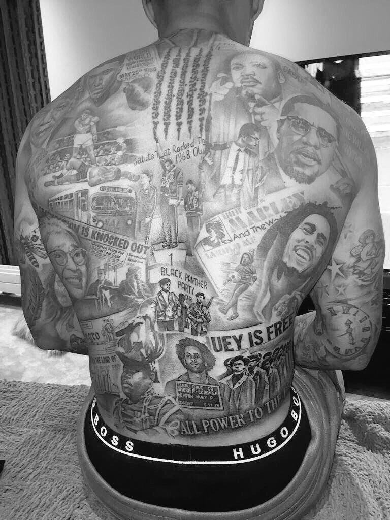 EPLBible's tweet photo. Andre Gray has completed a full back tattoo of significant individuals and events in the civil rights movement.

💉💉💉 https://t.co/CZJiWrJxAR