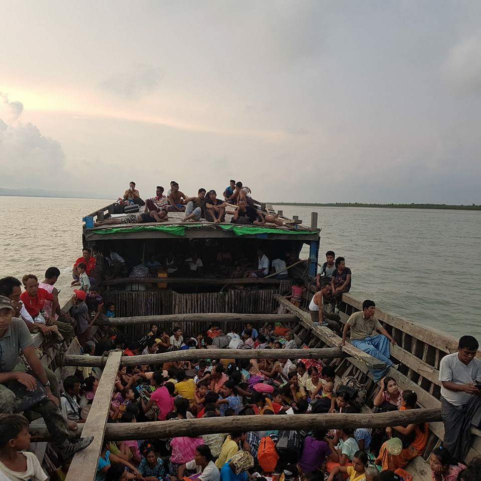 Local residents heading to Sittwe after extremist ARSA Bengalis (so called Rohingya) terrorist attacks and threats in Maungdaw, Arakan <a href="/hrw/">Human Rights Watch</a>