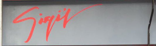 woodstreetwalls's tweet photo. It's raining but WSW's own @miawarner banging out some #handpainted #signage for @E17woodstreet's business @GiGisDressingRM #alwayshandpaint https://t.co/VDRrgRrqlA