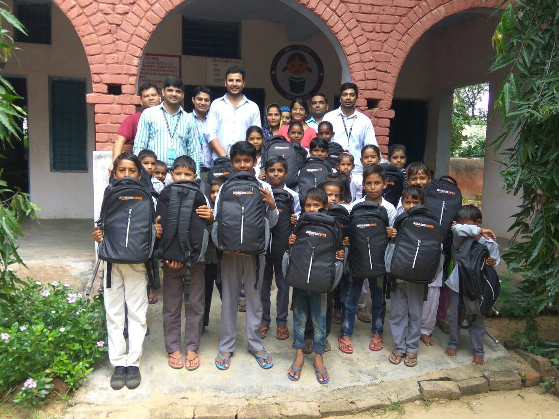 AmazonNews_IN's tweet photo. It's the season to give back! #AmazonCares Backpack campaign provided 625+ students around Delhi with basic school supplies #BehindTheSmile https://t.co/HdxbjgLh6I
